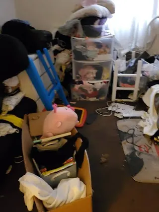 Interior furniture, boxes and belongings awaiting scope review