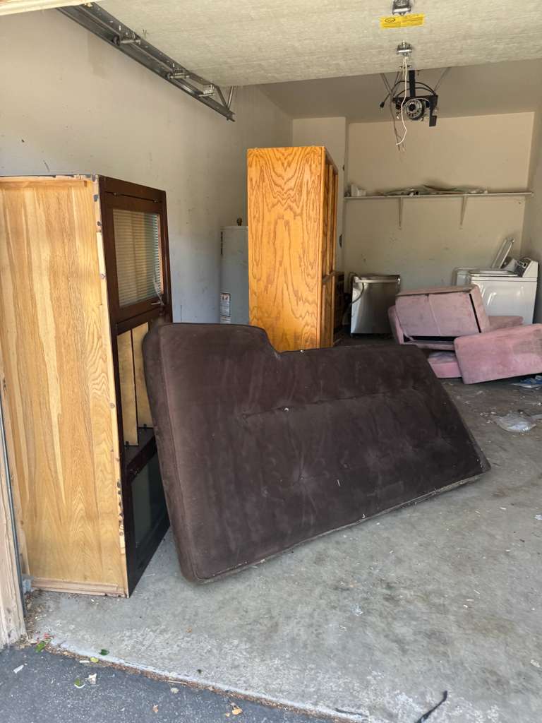 Baka crew job — residential garage cleanout with futon, cabinets and appliances, junk removal Los Angeles